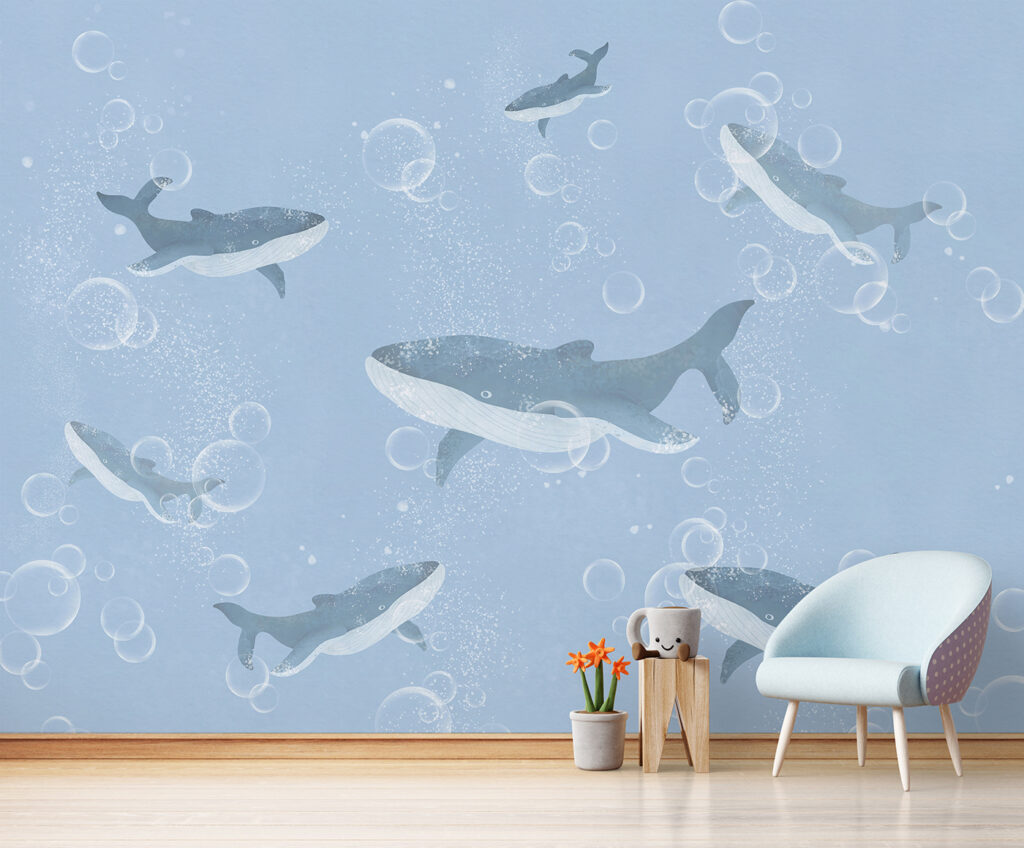 A group of whales swimming in water