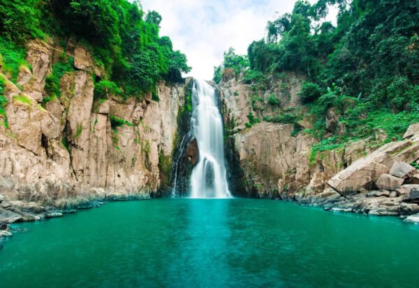 Wall murals Waterfall in a rocky area Wall murals Waterfall in a rocky area