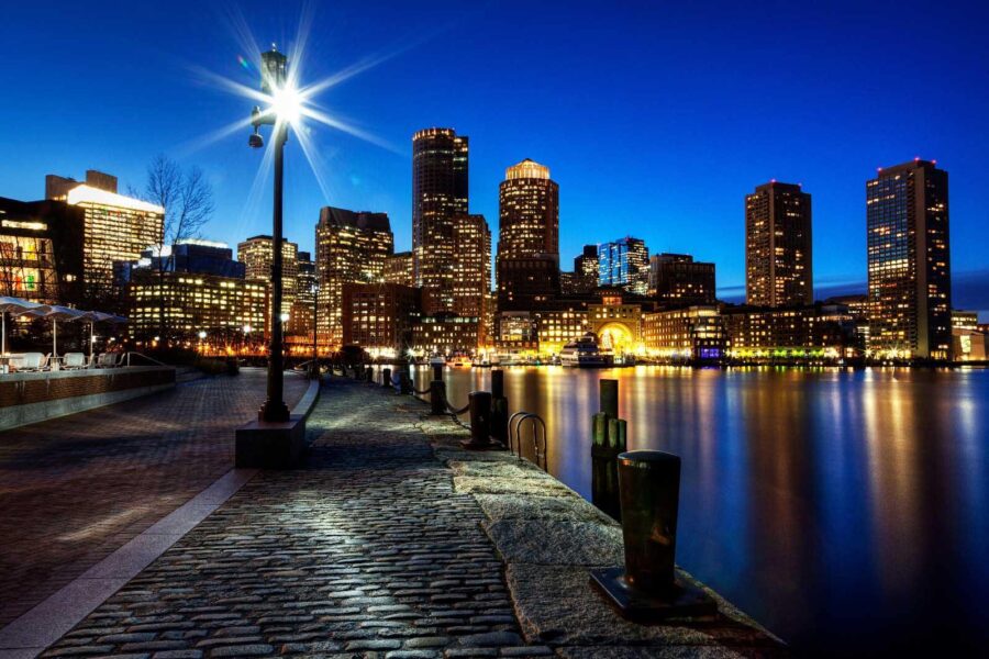 Wall murals City skyline at night with a body of water