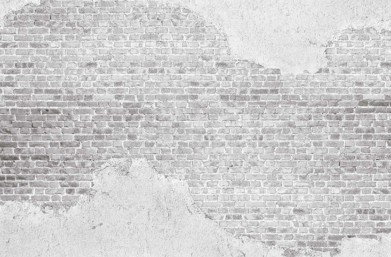 White brick wall with a white stain White brick wall with a white stain