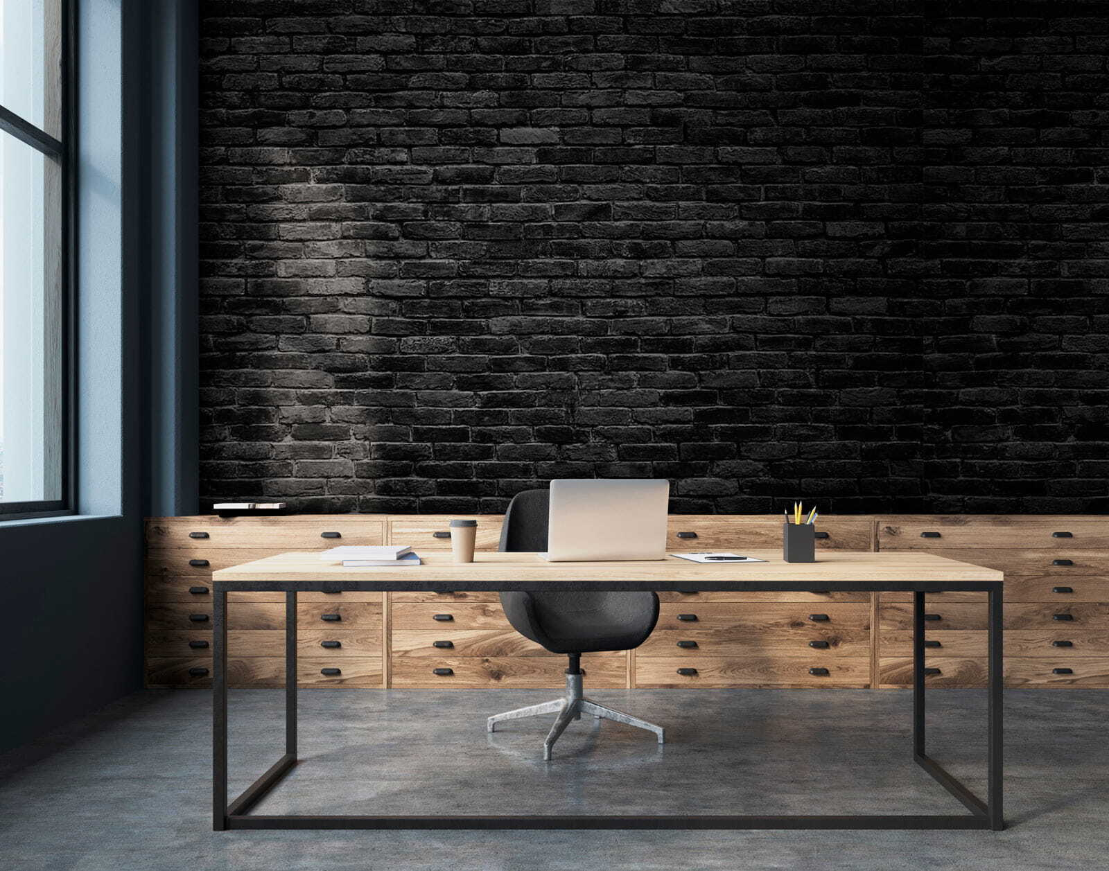 Black brick wall with a white spot Black brick wall with a white spot