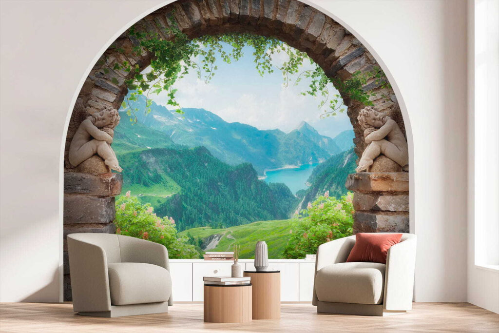 Stone archway with stone statues and a view of a valley and mountains Stone archway with stone statues and a view of a valley and mountains