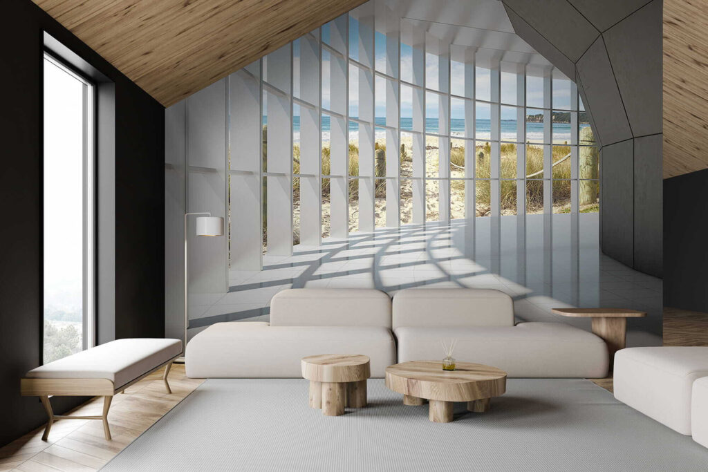 Large room with windows and a beach view