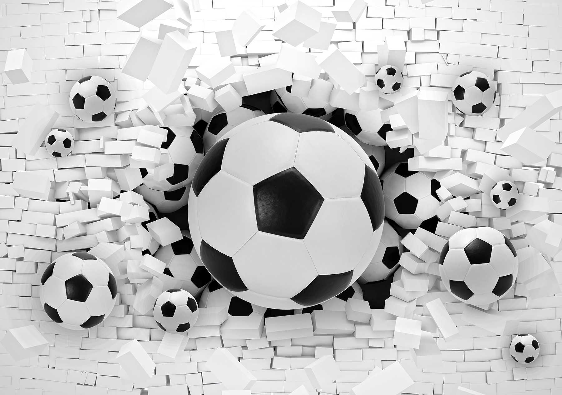 Group of football balls in a pile of bricks