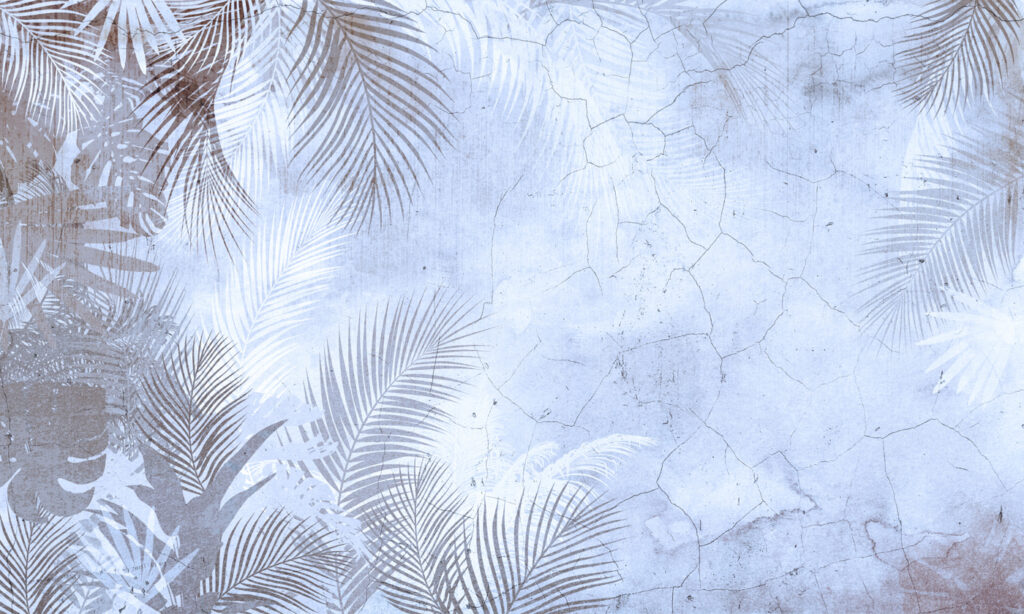 A wall with palm leaves