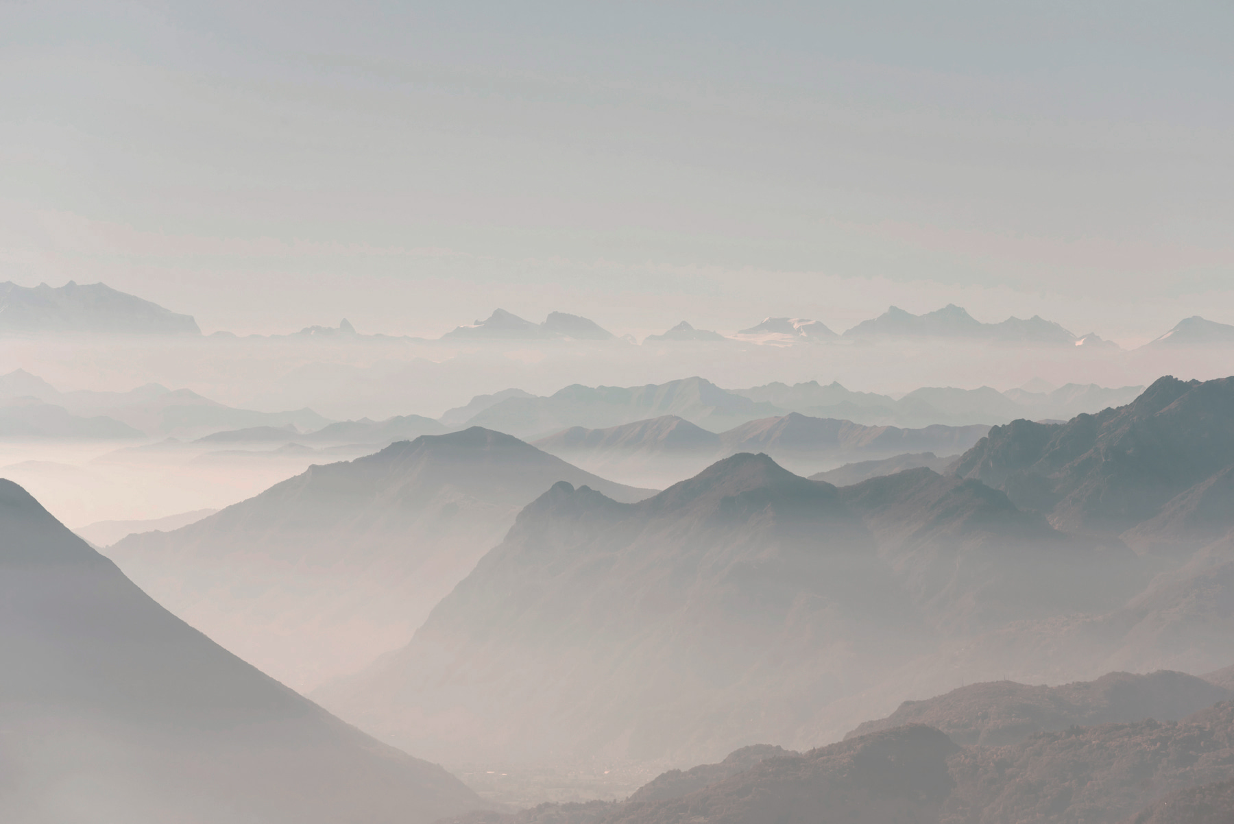 A mountain range with fog