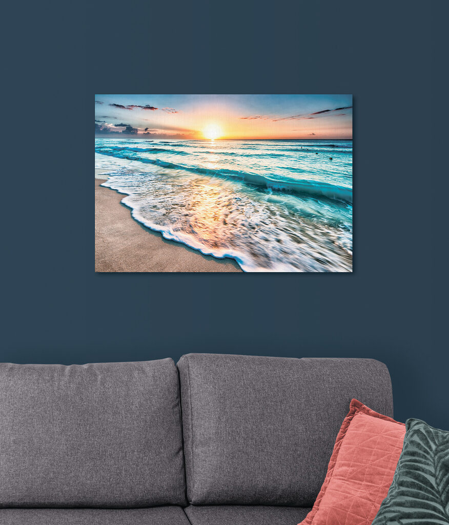 A beach with waves and a sunset A beach with waves and a sunset