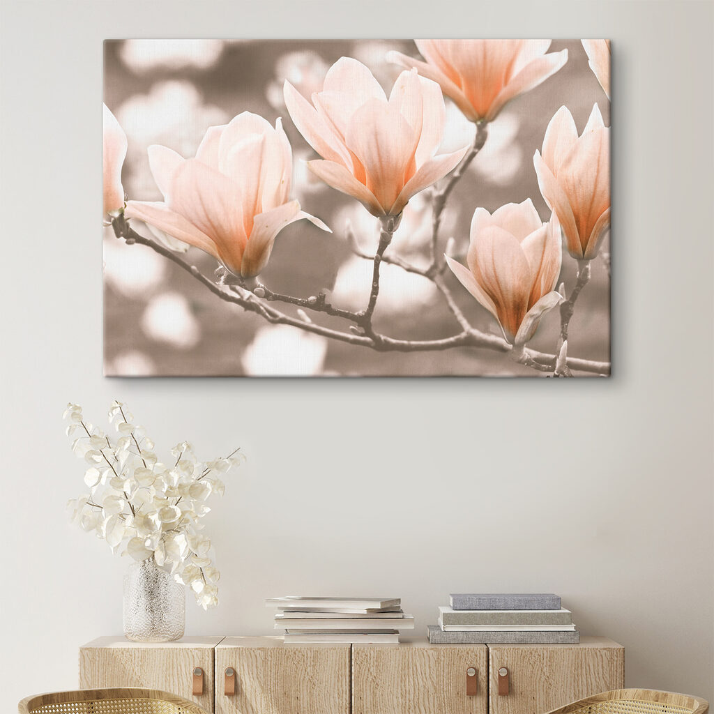 A group of flowers on a branch