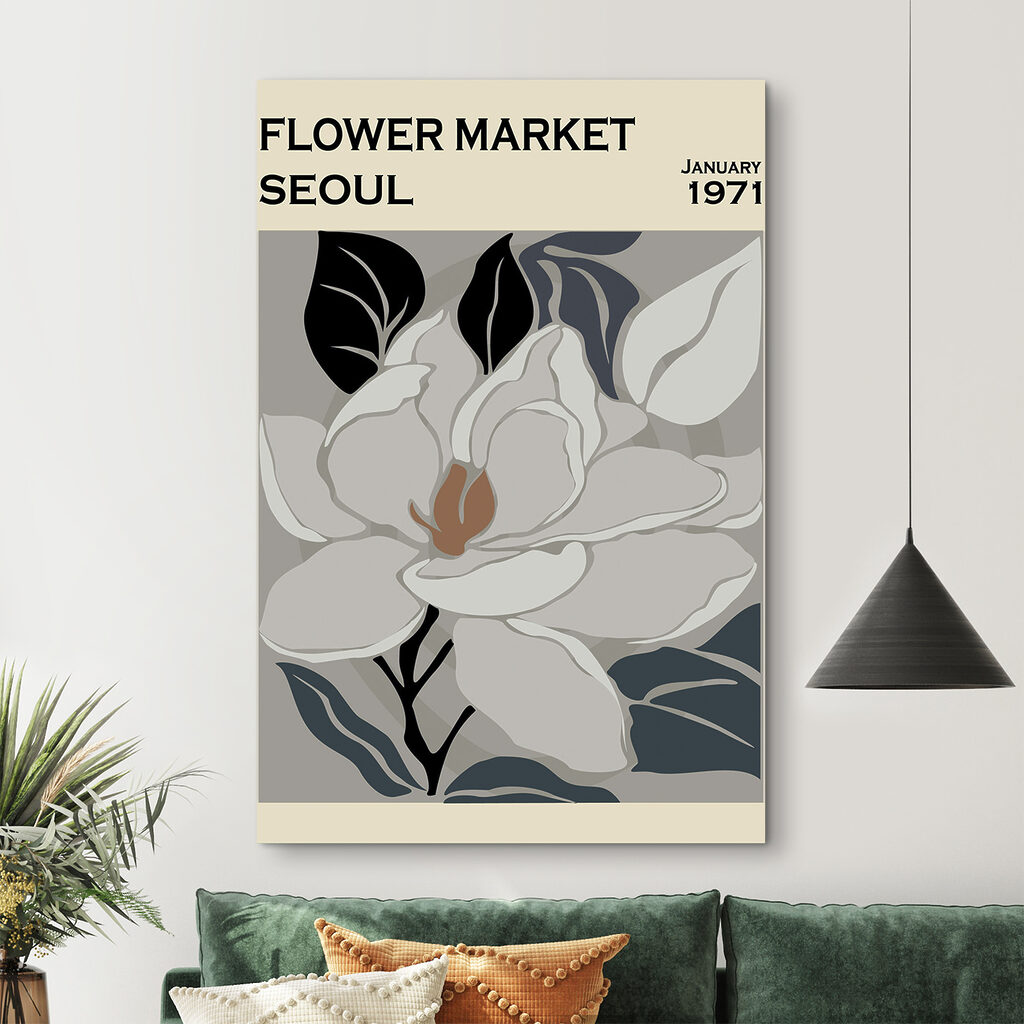 A white flower with black leaves