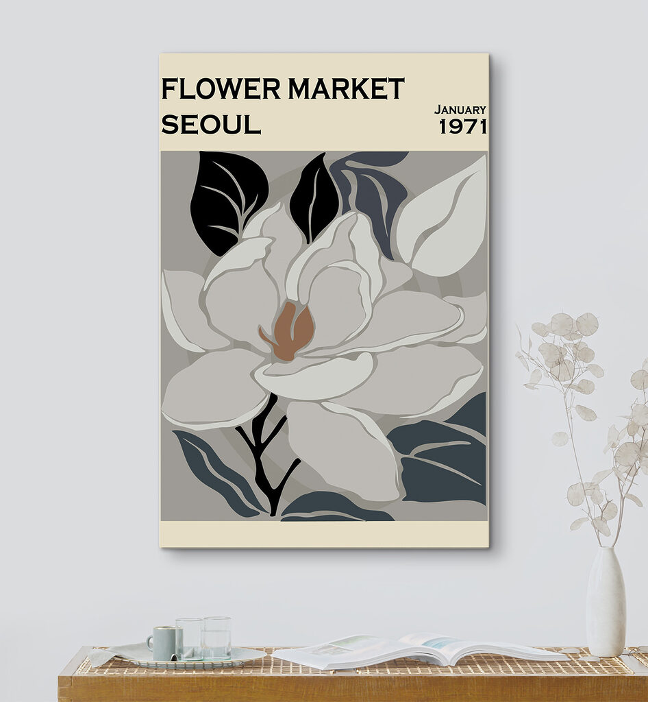 A white flower with black leaves