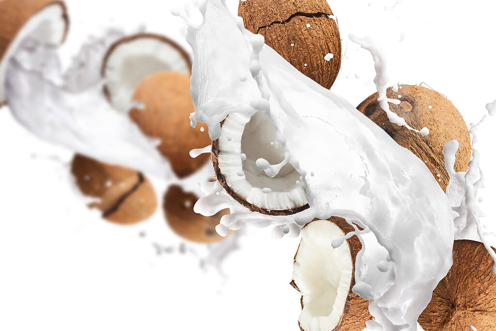 Coconut coconuts and milk splashing