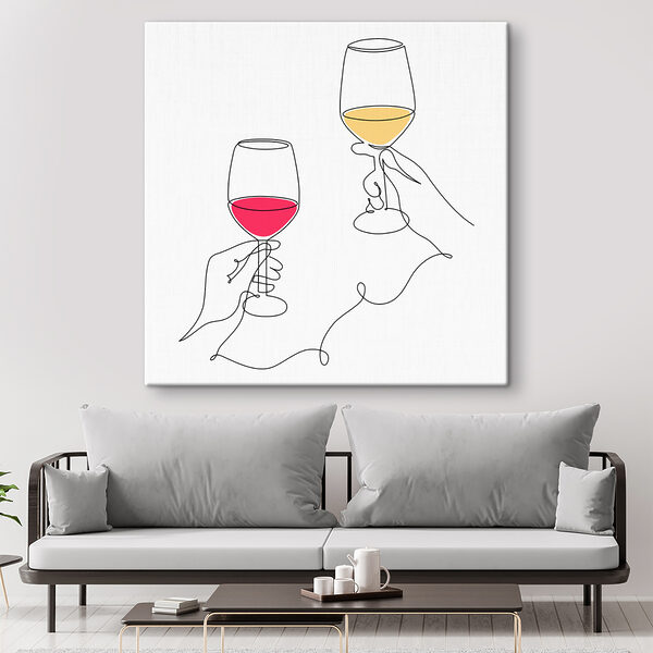 A hand holding wine glasses A hand holding wine glasses