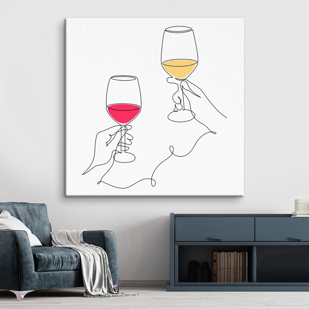 A hand holding wine glasses A hand holding wine glasses