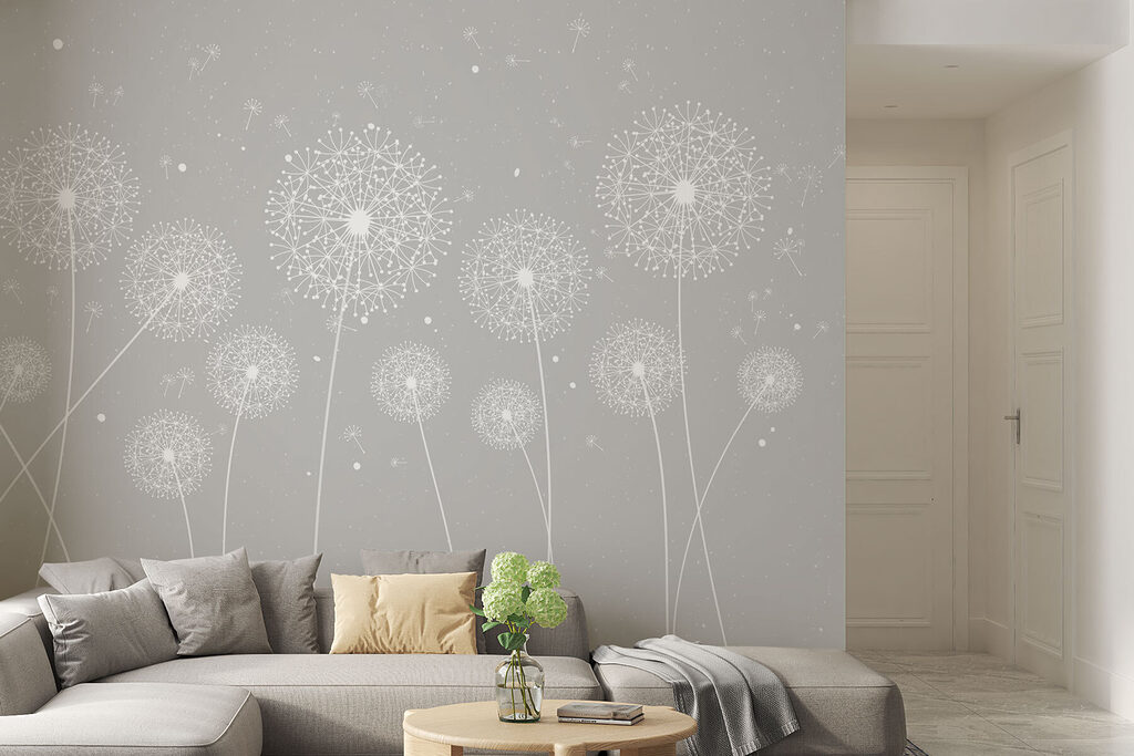 A white dandelions on a grey background A white dandelions on a grey background