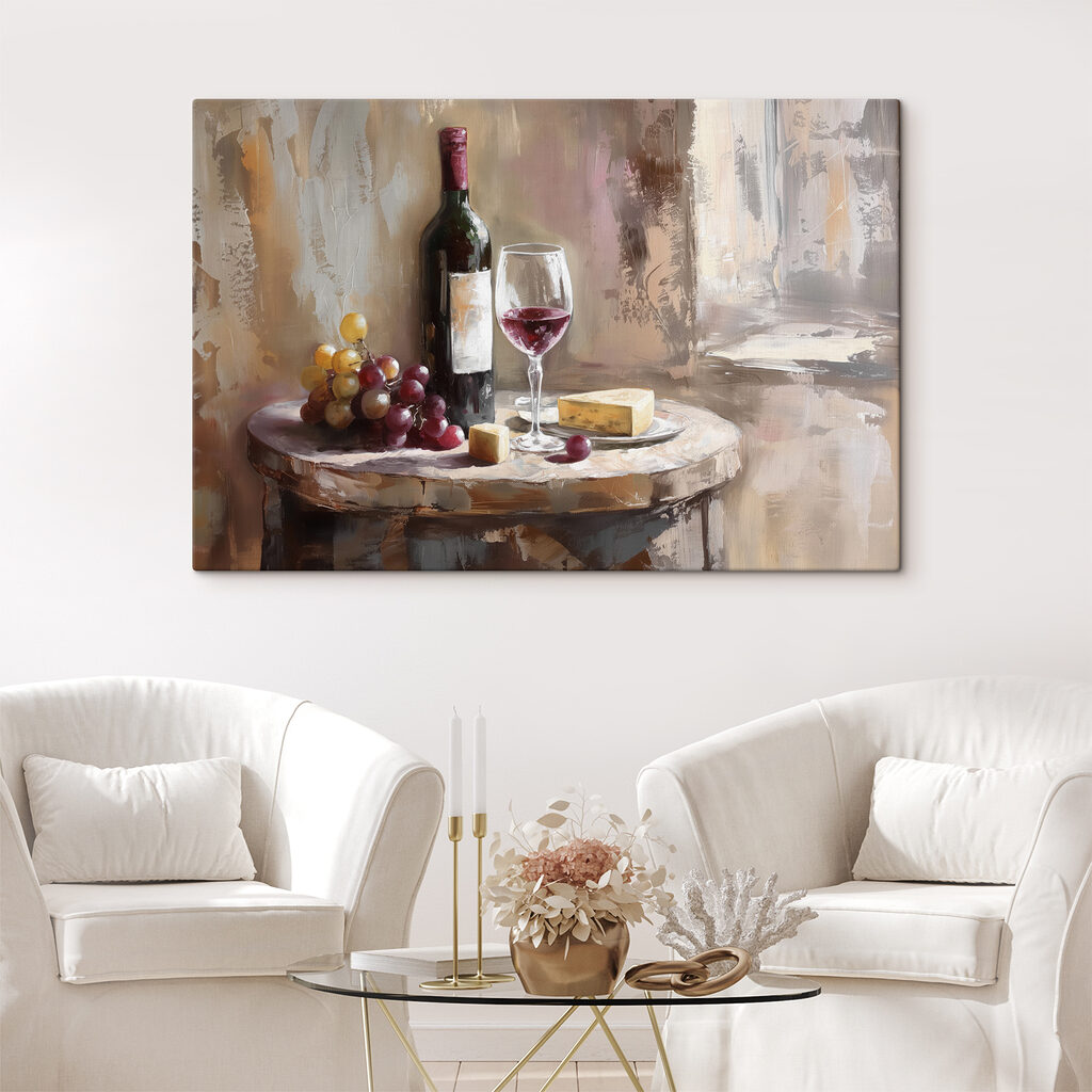 A wine bottle and grapes on a table