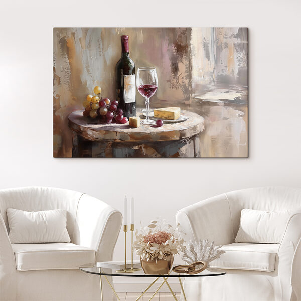 A wine bottle and grapes on a table