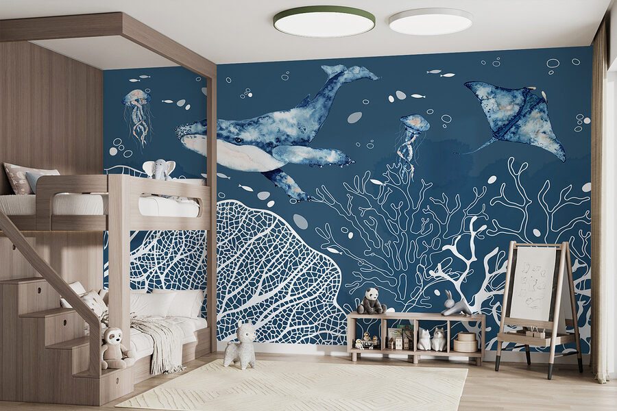 A whale and stingrays swimming in the ocean A whale and stingrays swimming in the ocean