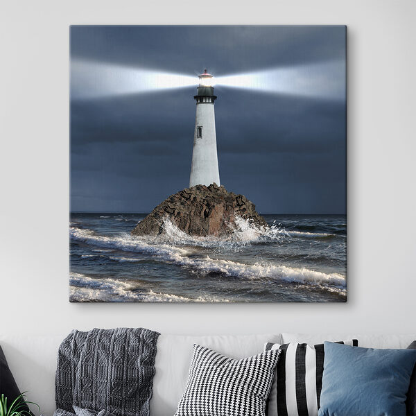A lighthouse on a rock in the ocean