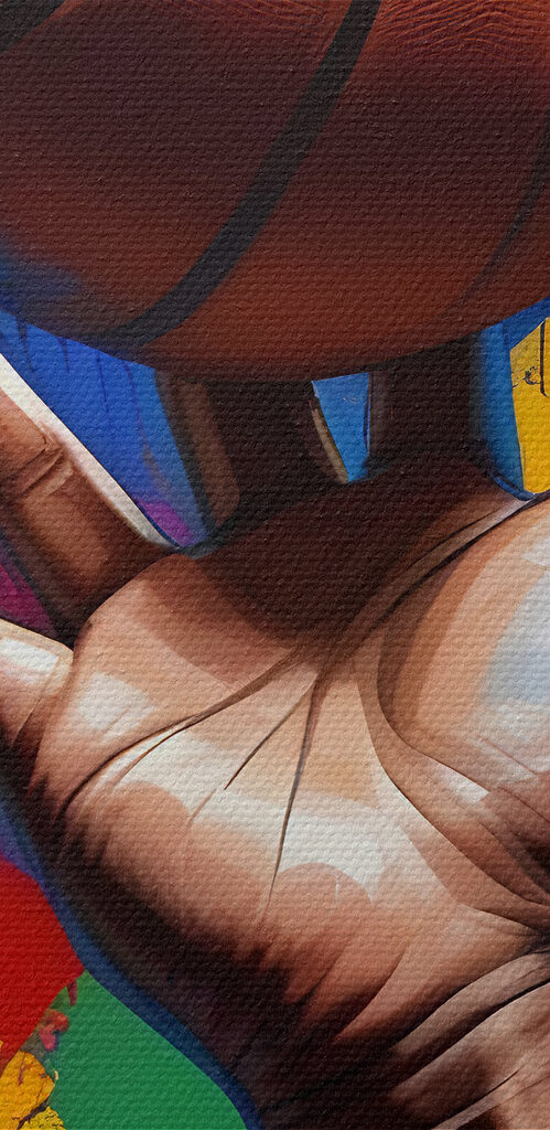 Hand holding a basketball