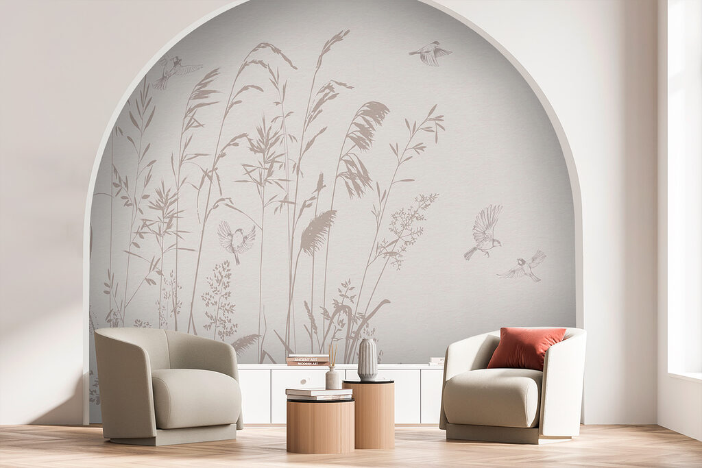 Birds flying over tall grass