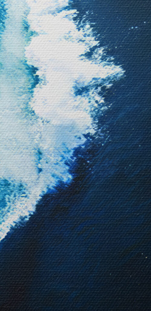 Wave crashing into the ocean