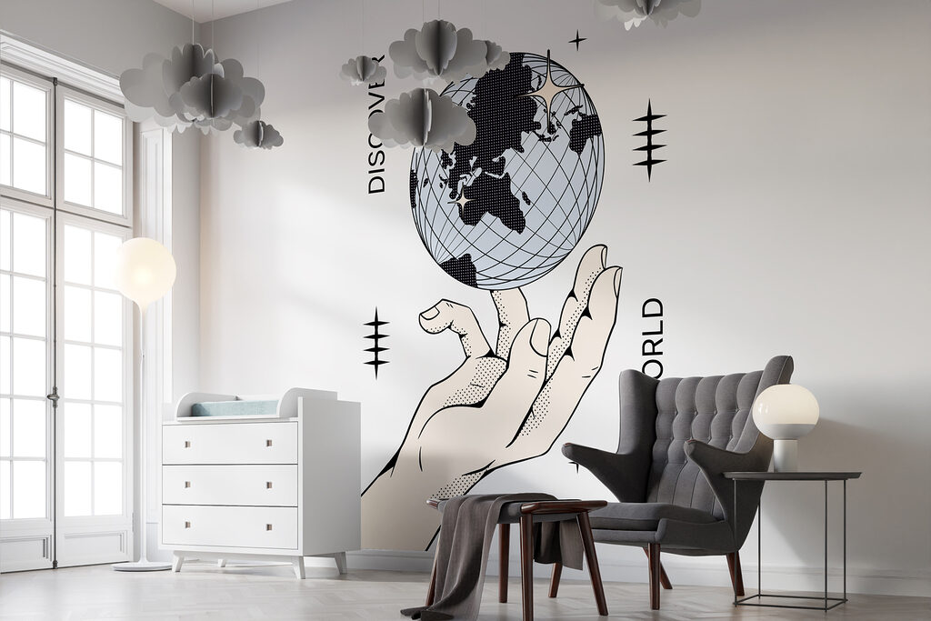 Hand holding a globe