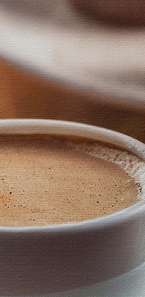 Cup of coffee and cupcakes on a table Cup of coffee and cupcakes on a table