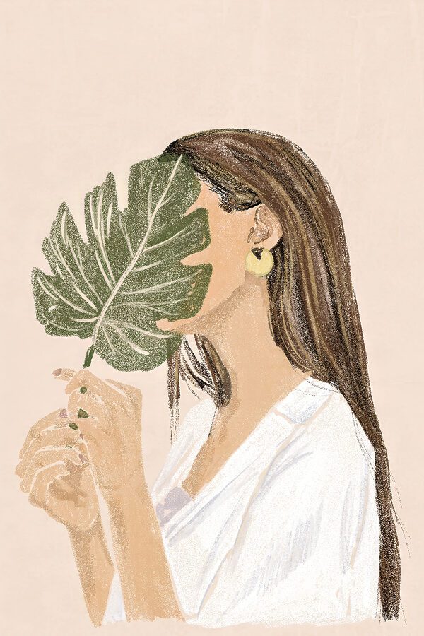 Woman holding a leaf Woman holding a leaf
