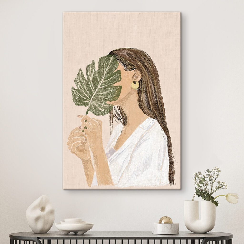 Woman holding a leaf Woman holding a leaf