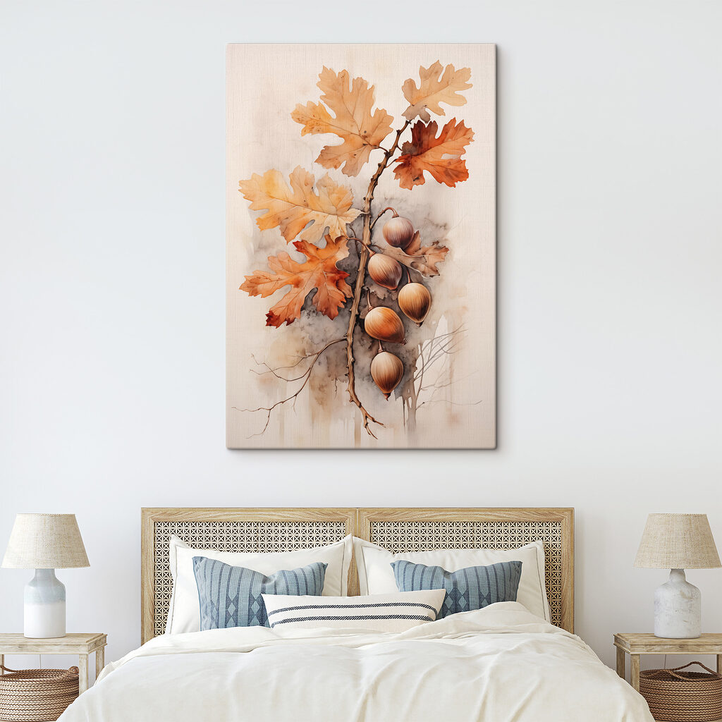 Acorns and leaves on a branch with a white background