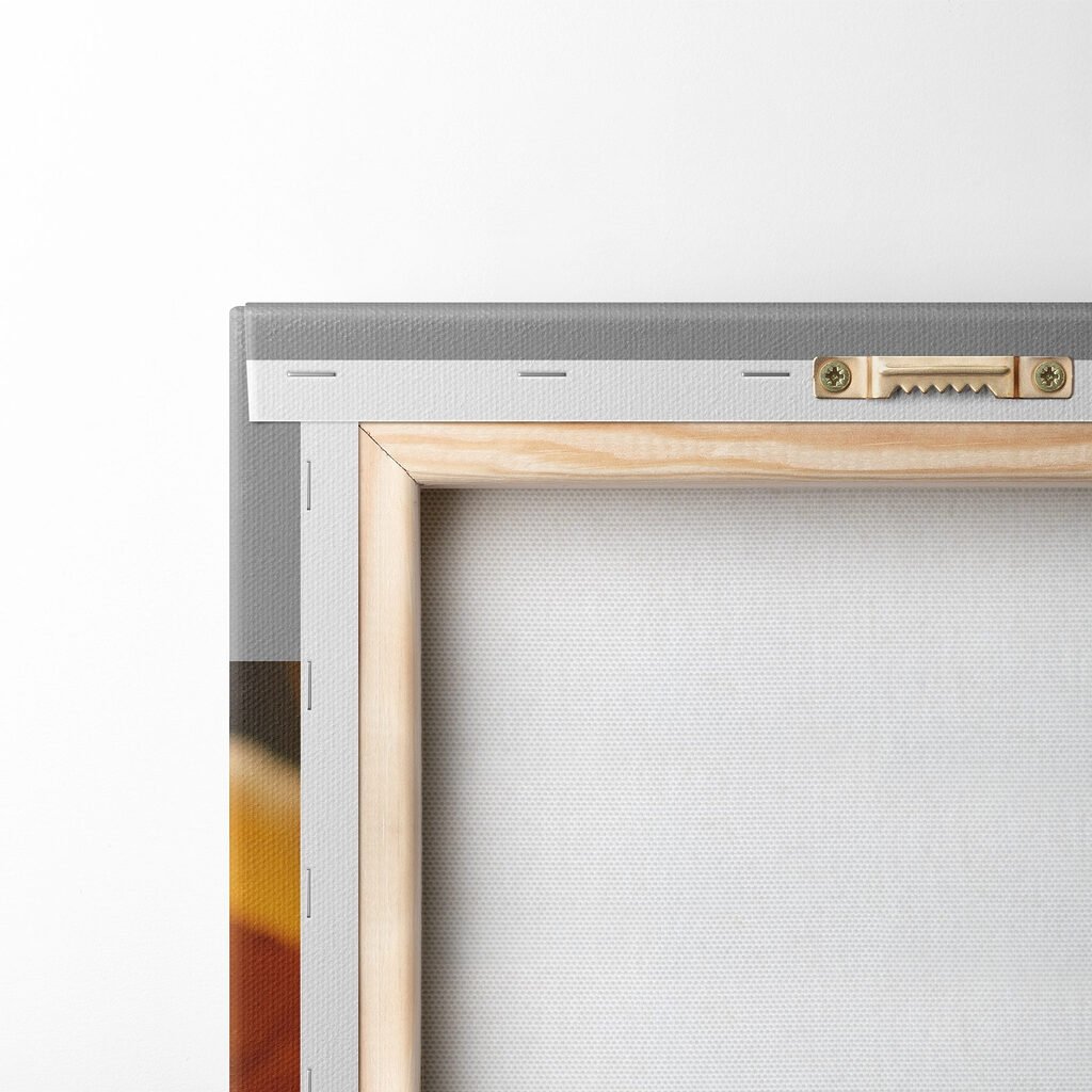 Black kitten in a pile of leaves