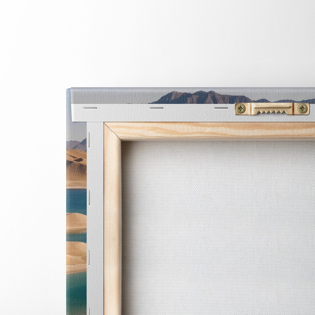 Desert with water and mountains in the background