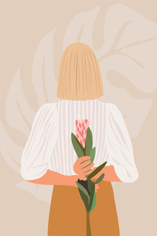 Woman holding a flower Woman holding a flower