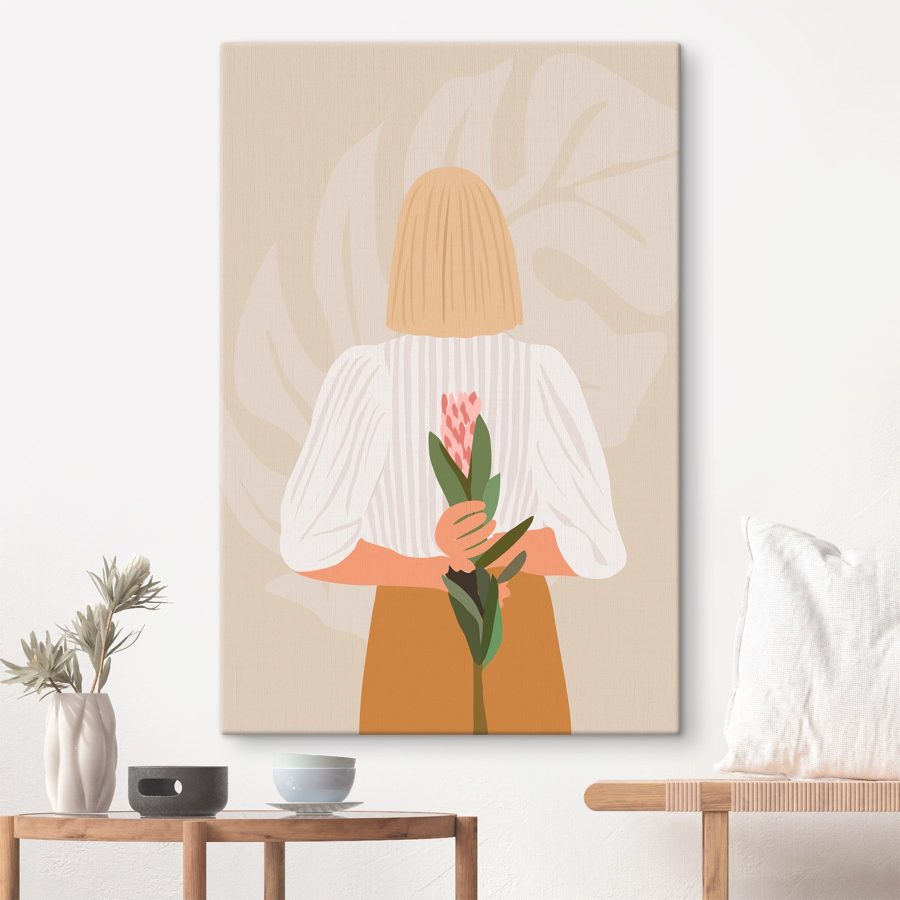 Woman holding a flower Woman holding a flower