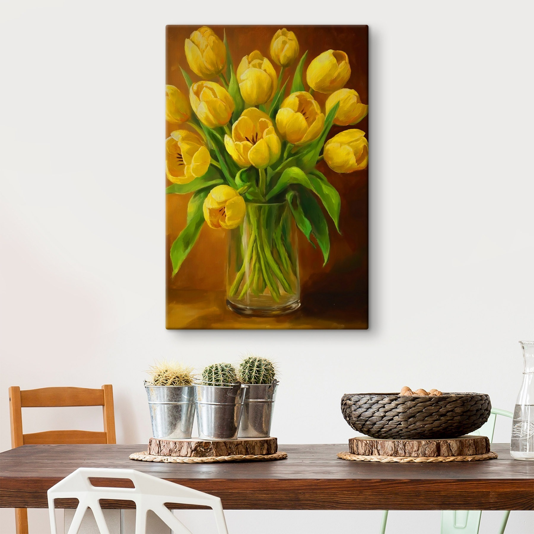 Painting of yellow tulips in a glass vase