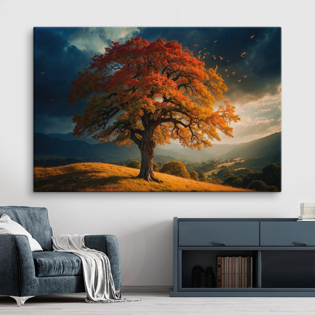 Tree with orange and yellow leaves on a hill