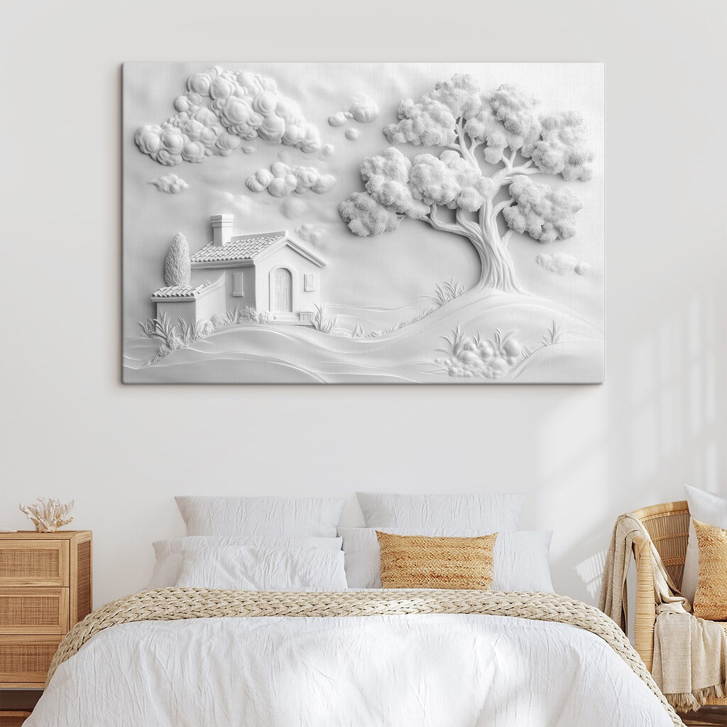White wall art with a house and tree