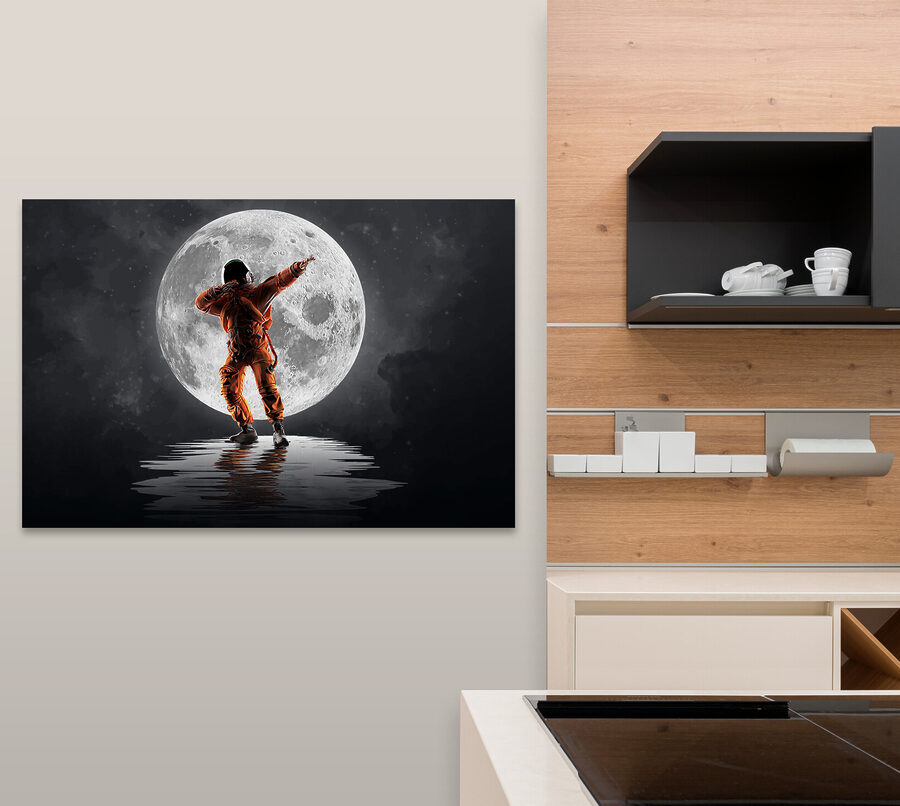Man in an orange suit standing in front of a full moon Man in an orange suit standing in front of a full moon