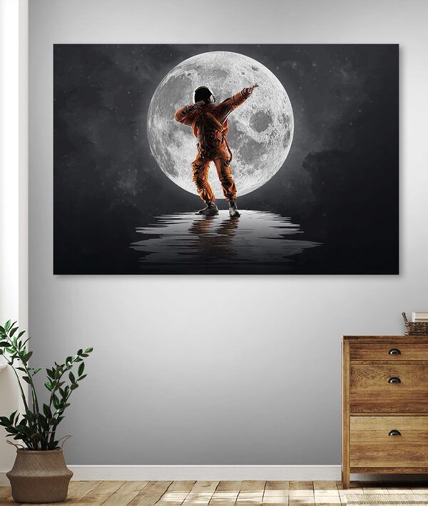 Man in an orange suit standing in front of a full moon Man in an orange suit standing in front of a full moon