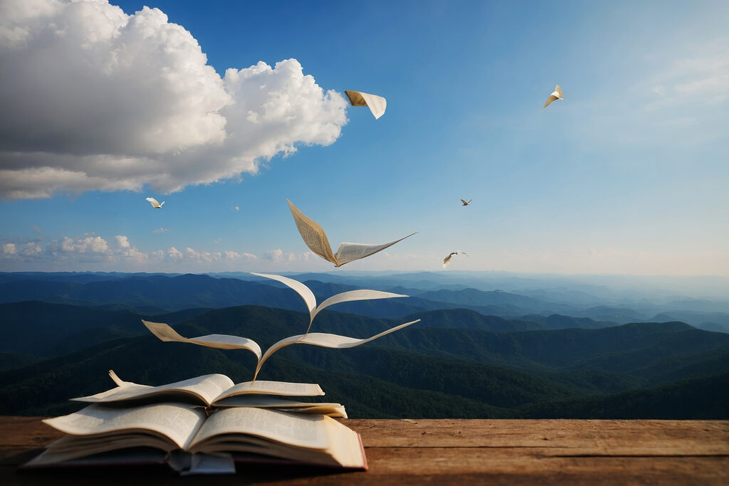 Book with flying birds flying out of it Book with flying birds flying out of it