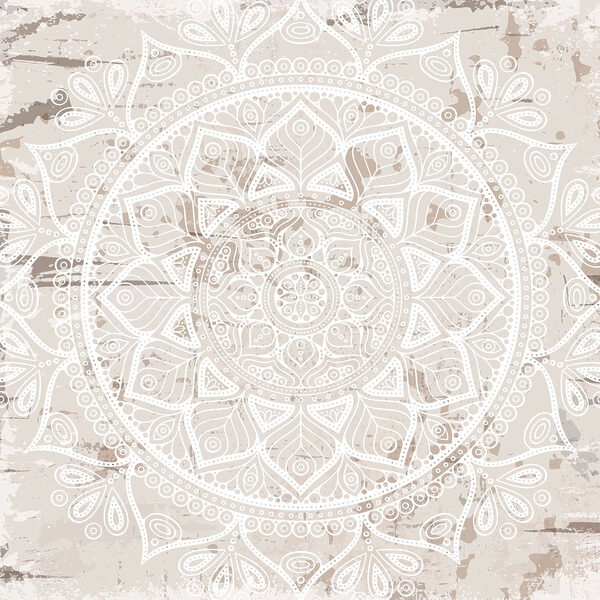 White mandala on a brown surface White mandala on a brown surface