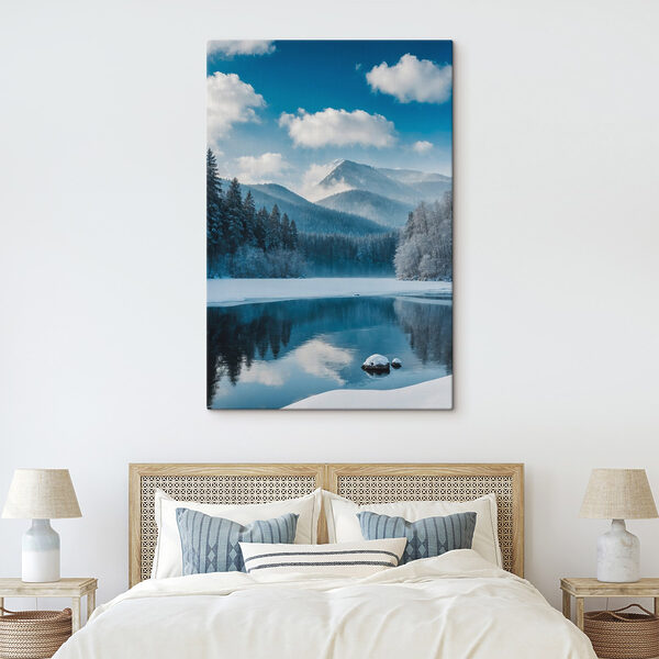 Lake with snow and trees in the background