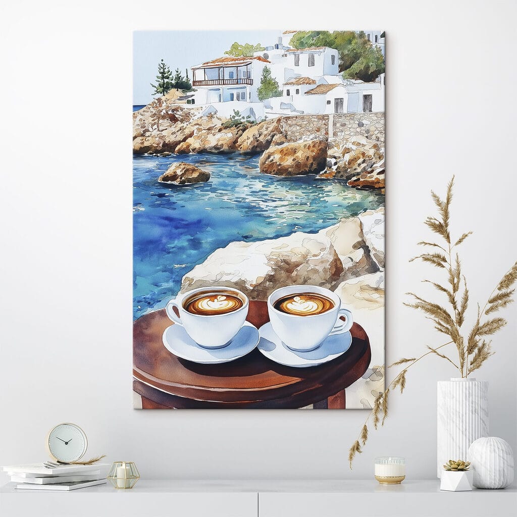 Two cups of coffee on a table next to a body of water