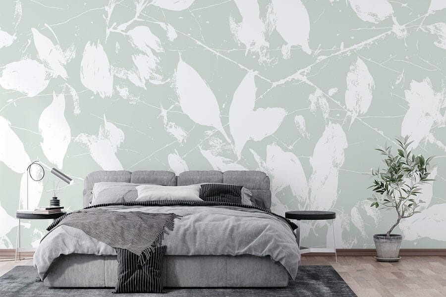White leaves on a light green background White leaves on a light green background