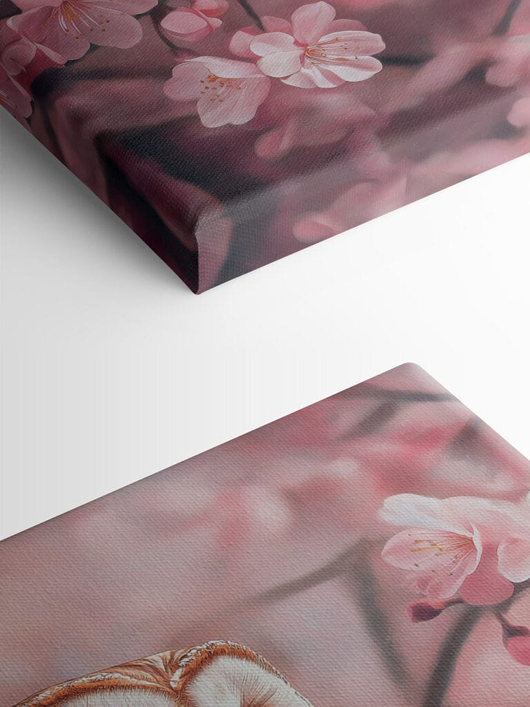 Owl sitting on a branch with pink flowers Owl sitting on a branch with pink flowers