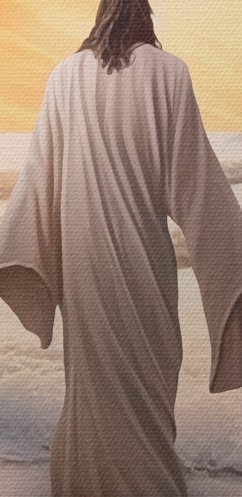 Person in a robe standing in the water