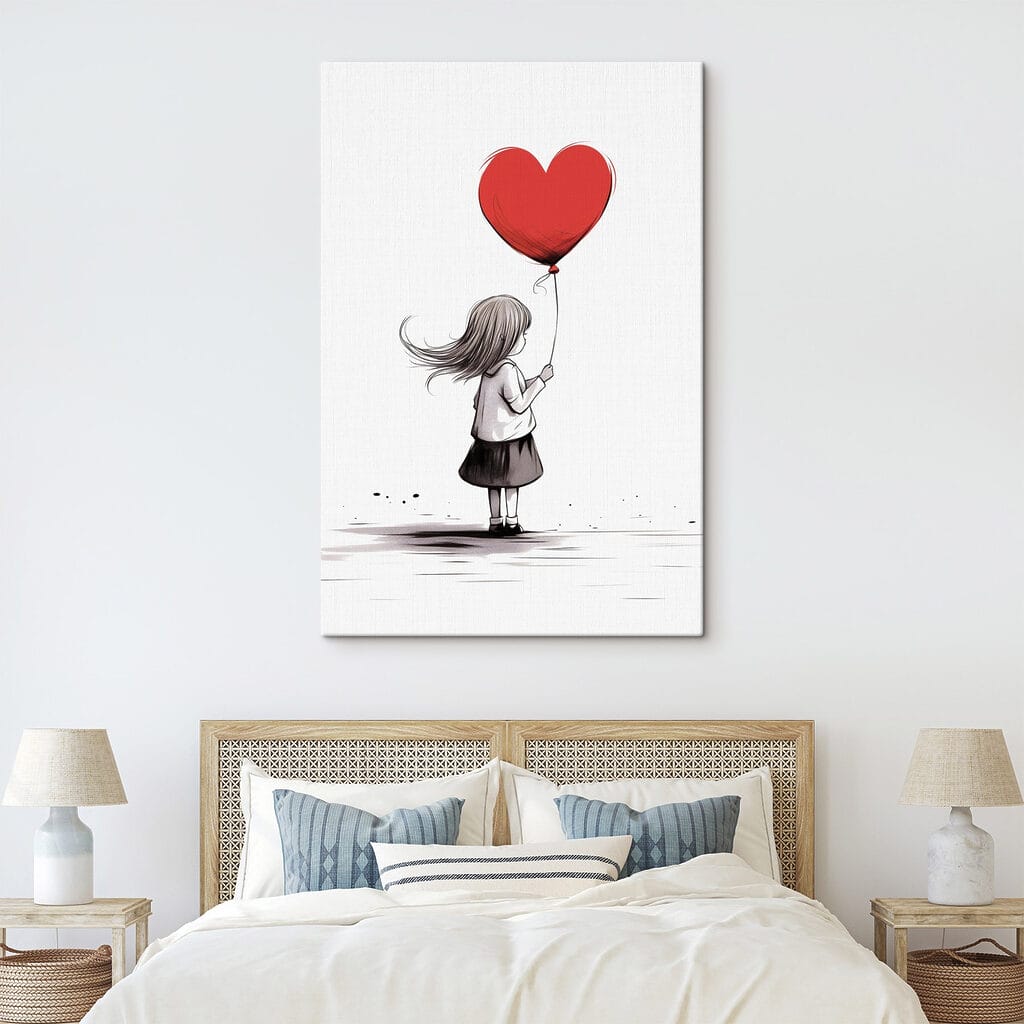 Girl holding a heart shaped balloon