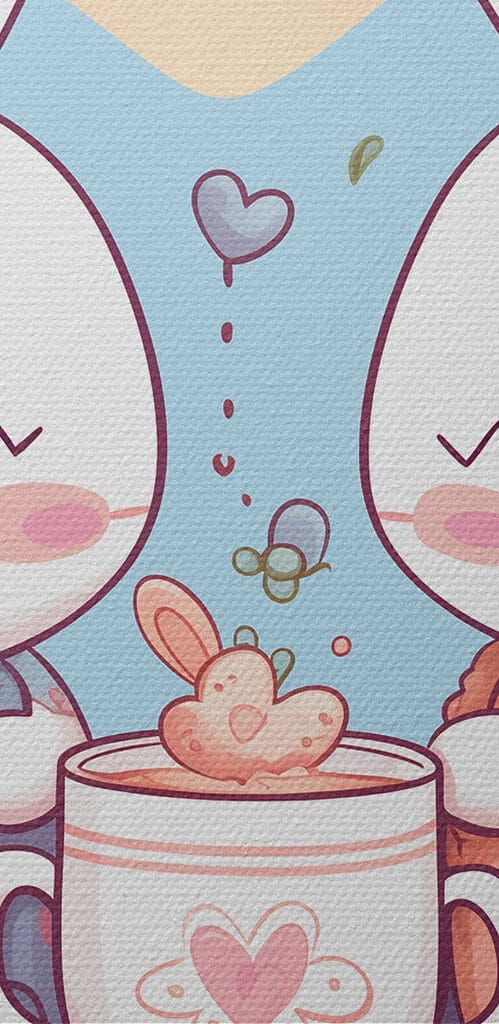 Couple of bunnies sitting on a tray with a cup of tea