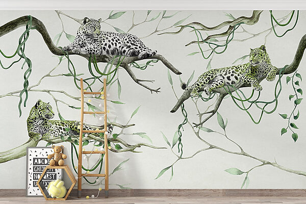 Group of leopards lying on branches