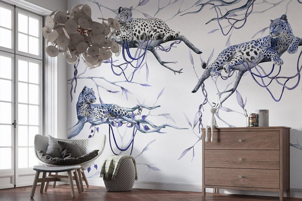 Group of leopards lying on branches